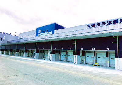 A photo of the Miura cold wholesale market with rows of numbered shutters